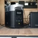 The EcoFlow DELTA 2 connected to a DELTA 2 Extra Battery, set up in the back of a camper van.