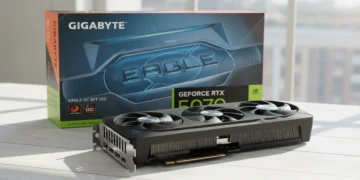 GIGABYTE RTX 5070 Eagle hardware and Eagle branded retail box on a white workbench