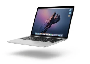 Apple MacBook Air 15 inch laptop open on a desk showing thin bezel display and aluminum chassis