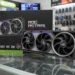 ASUS ROG Astral GeForce RTX 5090 graphics card and retail box displayed on a glass counter in a hardware store.