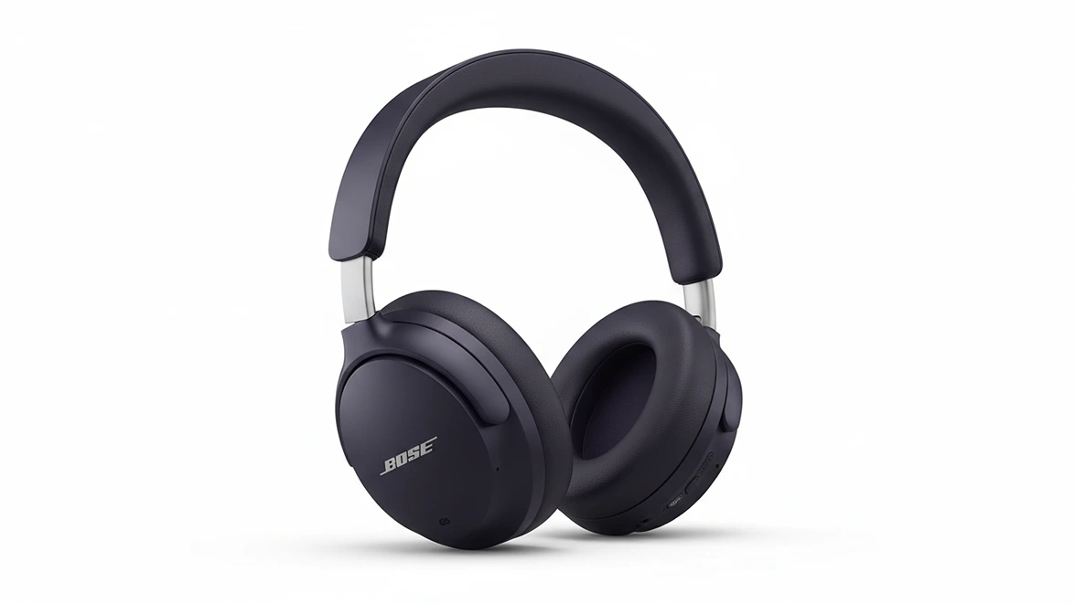 Black Bose QuietComfort Ultra over-ear noise canceling headphones isolated on a white background.
