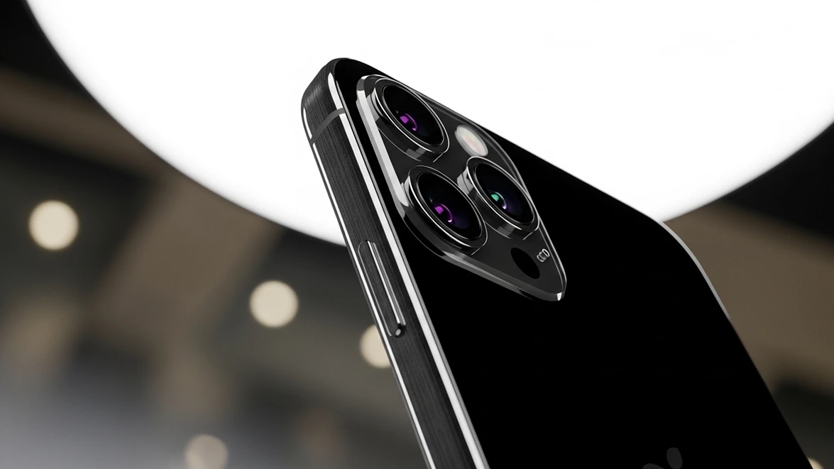 Left leaning profile of the iPhone 16 Pro in Black Titanium showcasing the vertical rails and hardware required to bridge the iphone 16 pro software gap.