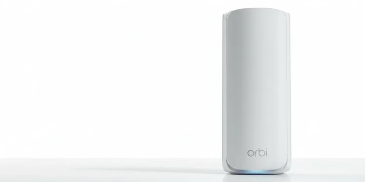 White Netgear Orbi mesh router unit standing on a white surface against a bright white studio background.